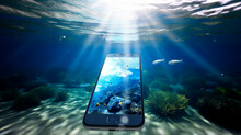 Mobile Phone On The Sand Under The Sea Wate