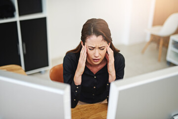 Business woman, computer and headache in office for information technology, software or online programming. Programmer or web developer with pain, migraine or stress for app crash, error or mistake