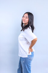 Wall Mural - Pretty Young Woman Wearing Casual White T-Shirt for Fashion Mockup