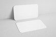 © Regi Munandar - blank minimal clean 90x50mm us size horizontal brand identity business name card with round corner leaning to wall realistic mockup design template 3d render illustration