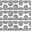 Seamless ethnic vector pattern. Ornamental pattern with circles and dotted wavy lines. Ethnic background. African style pattern. Black and white seamless tribal wavy background. For textile, fabric, w