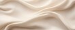 Beige linen fabric with abstract wavy pattern. Background and texture for design, banner, poster or packaging textile product. Closeup. with copy space for photo text or product, blank empty copyspace