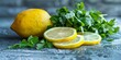 Sliced lemon and fresh parsley set on a dark, textured surface with dramatic lighting.