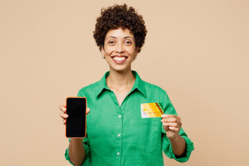 young woman wear green shirt casual clothes using blank screen mobile cell phone hold credit bank ca