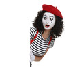 © New Africa - Funny mime with blank poster posing on white background