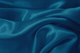 Fototapeta Desenie - Dark blue fabric cloth texture for background and design art work, beautiful crumpled pattern of silk or linen.
