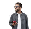 Young handsome man using smartphone isolated transparent PNG. Smiling student men with mobile phone looking away to copy space isolated portrait. Modern lifestyle, connection, business concept