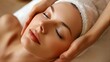 © jutamas - A woman is getting a facial massage in the cosmetic room of a beauty salon