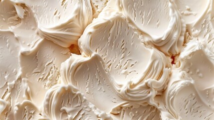 Wall Mural - Close-up image showcasing the rich texture of creamy whipped cream or frosting.