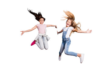 Full length body size view of two people nice lovely attractive cheerful straight-haired pre-teen girls having fun day daydream yes goal achievement free time isolated on blue background