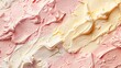 Close-up view of swirled pink, white, and beige cream textures.