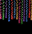 decorative multicolored streamer ribbons over black