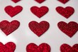 red heart shapes on the white background in valentine's day