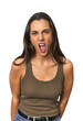 © Asier - Hispanic young woman shouting very angry, rage concept, frustrated.
