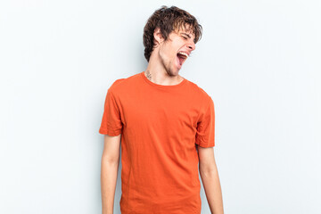 Poster - Young caucasian man isolated on blue background dancing and having fun.