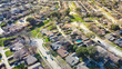 Multiple cul-de-sac dead-end street that shapes like keyholes in suburban residential neighborhood outside Dallas, Texas, aerial view subdivision single family houses with swimming pools backyard