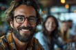 © Larisa AI - A close-up shot of a happy, bearded man wearing glasses, exuding a friendly and relaxed demeanor