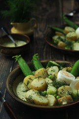 Wall Mural - A bowl with farming summer salad in rustic style