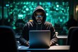 © Photocreo Bednarek - Focused man in hooded sweatshirt programming late at night