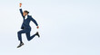 © metamorworks - Full body photo of a Black male business person jumping. (We also sell PNGs that are cropped and have transparent background. Please search for 'PNG' from the creator link.)