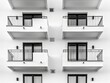 Black and White Photo of a Row of Balconies on a Building