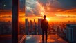 © lemoncraft - Silhouette of a contemplative businessman gazing at a vibrant sunset over the city skyline
