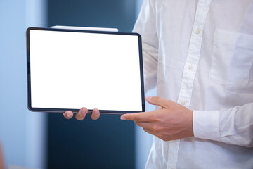 Man showing blank digital tablet isolated white screen. empty mock up copy space display advertising.