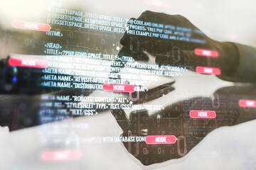 Wall Mural - multi exposure of abstract programming language hologram and hand working with a digital tablet on b