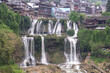 Beautiful waterfall in Furong Zhen town. Hmong Villages. Hunan province, China