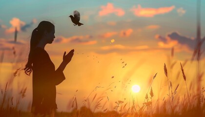 Wall Mural - Woman praying and free bird enjoying nature on sunset background, hope concept Human hands open palm up worship. Eucharist Therapy Bless God Helping Repent Catholic Easter Lent Mind Pray. Christian 
