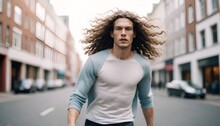 Design Minimal Outfit Tall Male Super Model With Curley Hairs And Behind It A Blurred Concept Of A Street