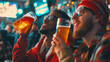 © A Stock Studio - Two friends drink beer and watch a football match while sitting in the sport bar. Sports fans watching matches on screen.