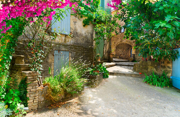 Wall Mural - beautiful old towncosy street with stairs of Provence at summer day, France