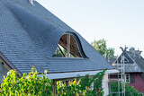 Fototapeta Krajobraz - Neues Dach mit einer Fledermausgaube