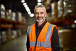 © Darya - Mature man with a reassuring smile, sporting a safety vest, stands proudly in a well-lit warehouse, symbolizing expertise and work safety.