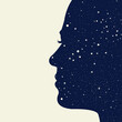 Profile of a woman with face and hair full of stars