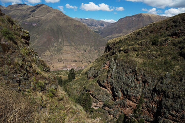 Beautiful landscape made up of mountains seen through a wide gap between two other mountains