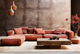 Fototapeta  - Red modular corner sofa against blank brown stucco wall with copy space. Loft interior design of modern living room, home.