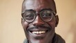 Joyful African Man Smiling with Glasses Portrait