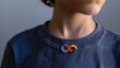 Autism Awareness Day: Teen with Rainbow Infinity Pin on T-Shirt Generative AI
