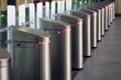 Turnstiles at the entrance a metro or railway station,  automatic ticket gate, Automatic ticket barriers