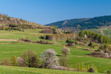 Fototapeta  - wiosenna panorama w Beskidach z widokiem na góry
