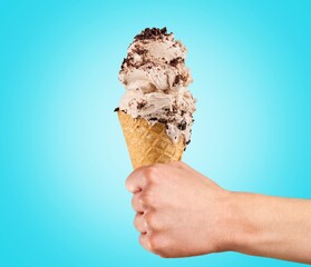 Poster - Cold sweet Ice cream in cone  in hand