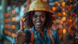 African woman in hard hat and casual attire giving a thumbs-up signal. Concept Portrait, African woman, Hard hat, Casual attire, Thumbs up