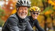 © Viktor - A close-up of individuals on bicycles donning hellets  Two individuals, each riding a bike and wearing helmets
