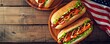 Gourmet hot dogs with condiments on a round wooden plate. Traditional American food concept.