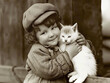 Vintage Sepia Portrait of Girl Holding Cat