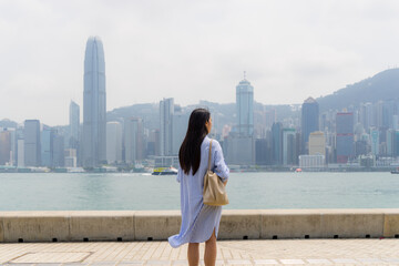 Canvas Print - Woman visit Hong Kong city