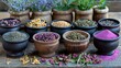 a variety of herbs in wooden bowls on a table
