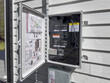 Connection panel for solar system - Rooftop solar panels connect to home's electrical system via an interconnection panel
